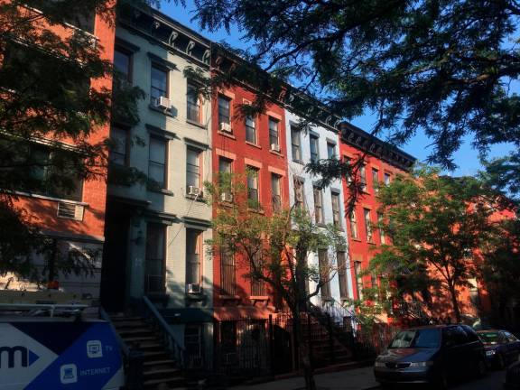 Late 19th century row houses on East 117th Street, in the new East Harlem Historic District. Photo: Diana Ducroz