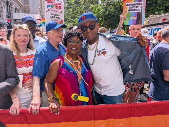 NYC Pride March brought out Council Member Virginia Maloney (left) and always Knicks Bronx D.A. Darcel Clarke and Queens Beep Donovan Richards.