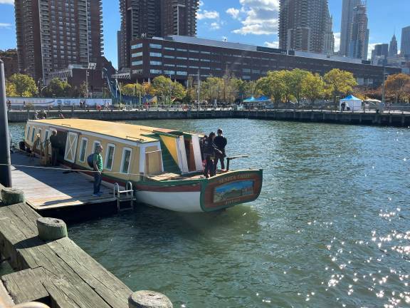 Visitors to Pier 26 in Tribeca check out the Seneca Chief replica on October 26. On the same date 200 years earlier, the original Seneca Queen completed its journey from the Buffalo through the brand new Eire Canal to Manhattan, marking a new era in the city as a thriving hub of commerce.