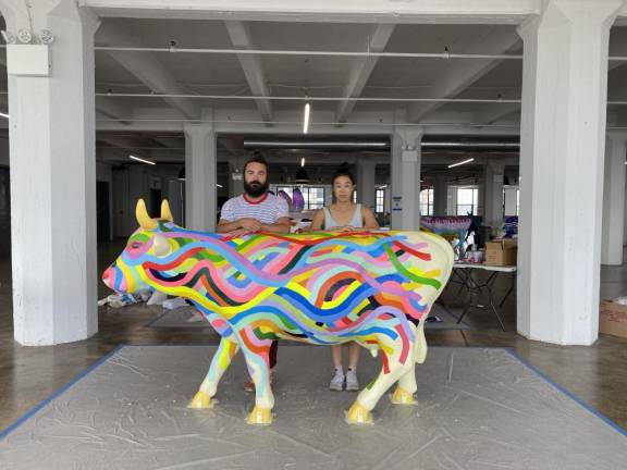 Adam Frezza and Terry Chiao working on Cowzza. Photo courtesy of Chiaozza