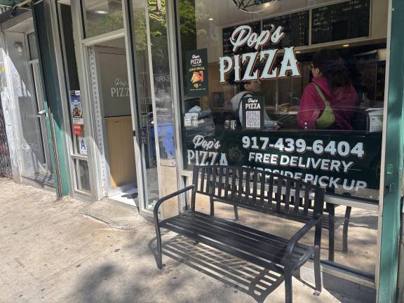 An unidentified man staggered to the bench outside Pop’s Pizza on Avenue “B” after a scuffle with Abdul Saleh who worked in Sal’s Deli. Both had gunshot wounds. Saleh died of his wound.