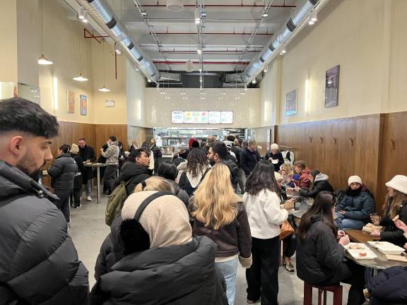 Apollo Bagels on West 35th Street at 9:30 a.m. on a weekday before Christmas. The wait was worth it.