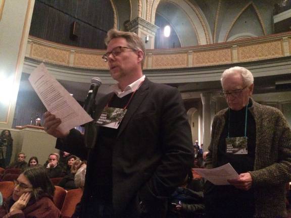 Adrian Smith, of the advocacy group Defenders of Teddy Roosevelt Park, speaking at a scoping session about the American Museum of Natural History's expansion project at the institution's Samuel J. and Ethel LeFrak Theater April 6. Next to him is Sig Gissler, the advocacy group's founder. Photo: Gabrielle Alfiero