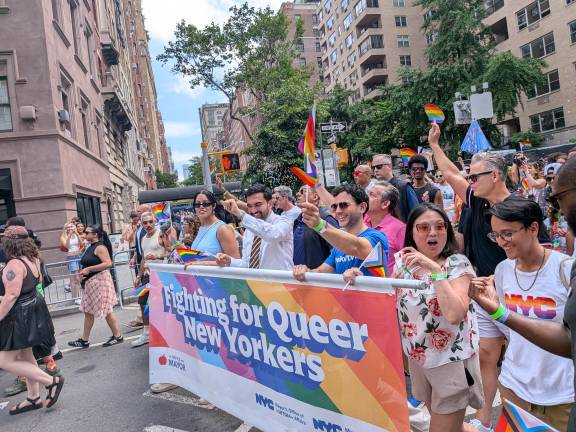 Mayor Mamdani and his cordon, including plainclothes cops, at NYC Pride March.