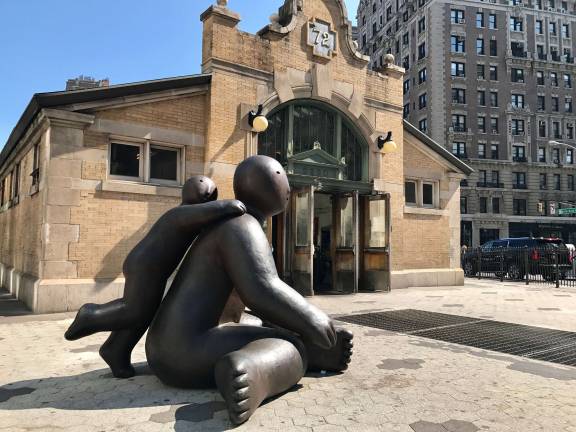 Joy Brown's &quot;One Leaning on Another&quot; outside Broadway's 72nd Street subway station. Photo: Elissa Sanci