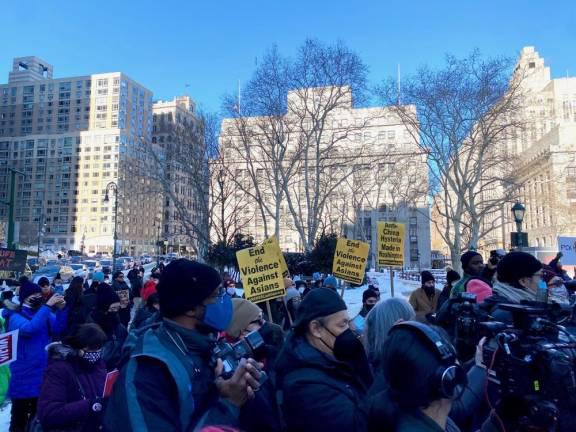 Signs at a rally in January 2022 demanding the end of anti-Asian hate. Photo: Ava Manson