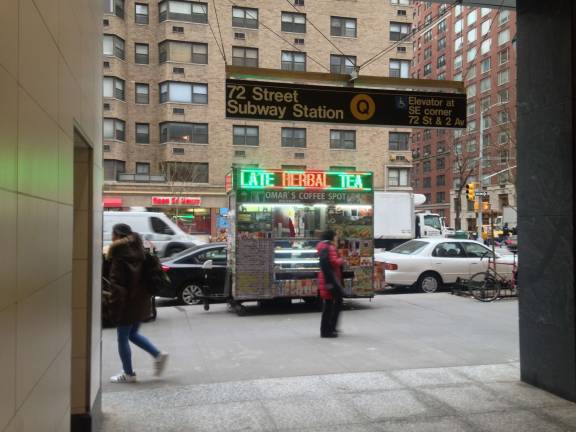 A proliferation of food carts have set up shop along Second Avenue following the completion of the subway line there. Omar Ismail's cart, pictured, is one of four that were doing business Tuesday morning near the northwest entrance to the 72nd Street station. Photo: Richard Khavkine
