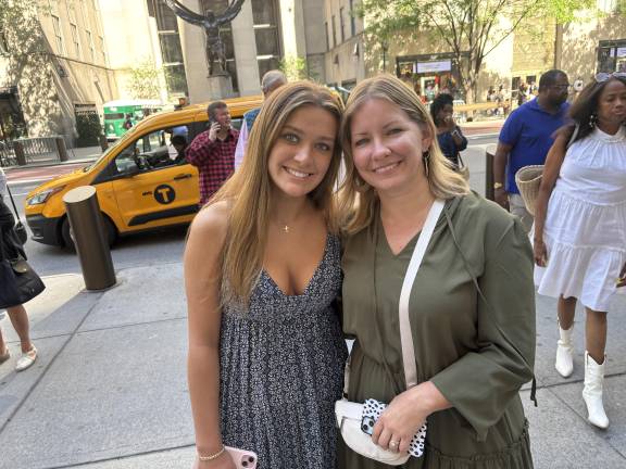 Reagan Thompson (left) and her mom, Kelly Thompson, were among the thousands of worshipers who flocked to St. Patrick’s Cathedral on May 11, the first Sunday since the election of Pope Leo XIV. Reagan said she hopes the new pontiff does more to get young Catholics involved in the church.