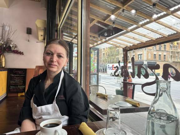 Galaza Halavi at her eponymously named restaurant on the UWS wearing an apron as she gets ready to work.