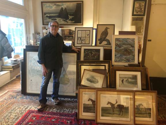 Book restorer Richard Rosenblatt at his corner of Argosy Book Store, where he has worked for 39 years while maintaining his career as a fine artist (and rock drummer).