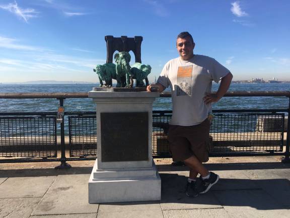 Joseph Reginella in Battery Park, next to his monument to the &#x201c;the biggest land mammal tragedy in the nation.&#x201d; Photo: Mihika Agarwal