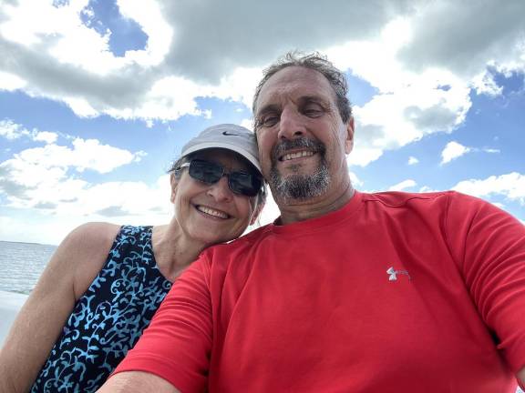 Before the fall: The author with his wife, Susan, on vacation in the Caribbean.