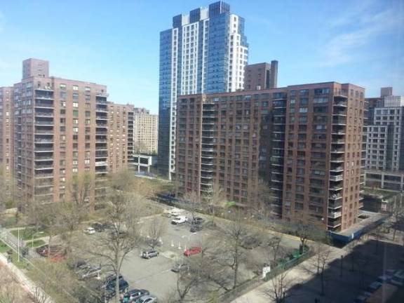 The site of the planned 20-story nursing home is currently a parking lot.
