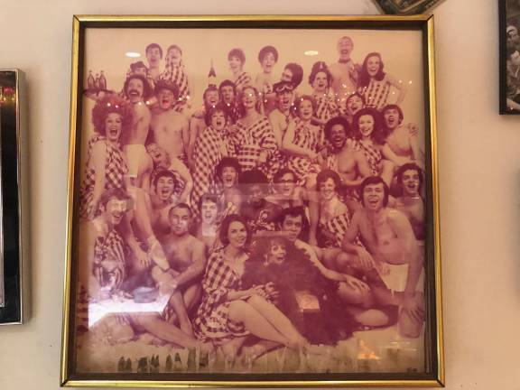 From Horne’s wall of fame, a framed photo of the cast of the Broadway production of “Applause” starring Lauren Bacall.