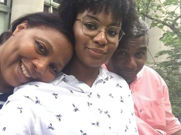 Thamara Jean (center) with her parents, Grace&#160;Arnauld&#160;(left) and Vital Jean (right). Photo courtesty of Thamara Jean