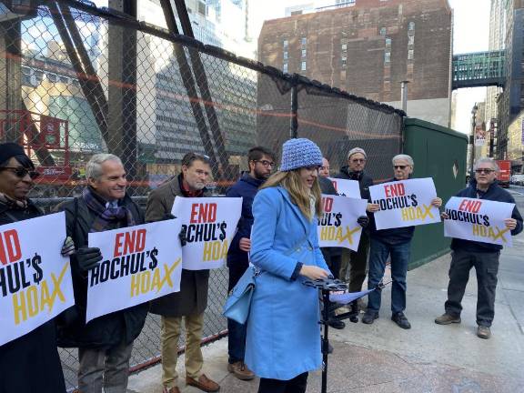 Diana Gonzalez, executive director of New Yorker for a Better Penn Plan, leads protestors at a Dec. 19 rally at the site of the old Pennsylvania Hotel that was demolished by Vornado Realty Trust earlier this year. She is calling on Governor Kathy Hochul to abandon her current plan for more office towers. She wants housing instead. Photo: Michael Oreskes