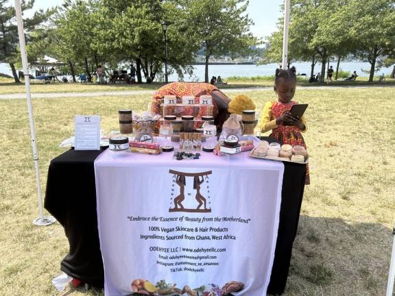 Nana Boateng and her 6-year-old daughter getting ready to sell vegan products for Juneteenth at As Black As It Gets!. Photo: Alessia Girardin