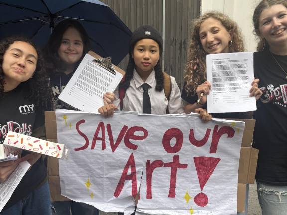 Middle School Students seek signatures to a petition to the Department of Education, urging the city restore the provider of its after school arts program. The DOE is switching from Manhattan Youth to another provider, irking parents.