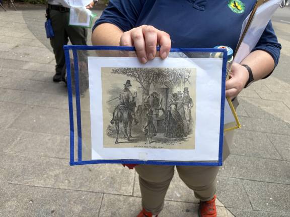 Urban Park Rangers complement their presentation with historic maps and illustrations.