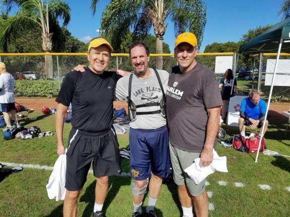 Stephan Russo (center) with his former college teammates and fellow Past Masters lacrosse players, Dave White and Dom Starsia. Photo courtesy of Stephan Russo