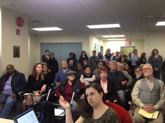 Around three dozen people came to Community Board 7&#x2019;s land use committee to support or oppose, in equal measure, an expansion of the former Mannes School of Music building on West 85th Street, which the Manhattan Country Day School is seeking to move into. Photo by Daniel Fitzsimmons.