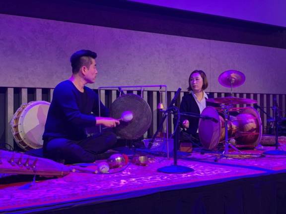 Two Korean percussionists, Kim So Ra and Hyun Seung Hun, play a piece for percussion at David Rubenstein Atrium in New York, on Sept. 19, 2019.