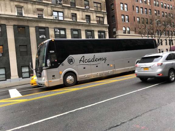 This Academy Bus, photographed by a West End Avenue resident as it motored south at 72nd Street on April 15, is in apparent violation of city rules that bar commercial traffic on the entire length of theavenue, from 59th Street to 107th Street. Photo: Courtesy of West End Preservation Society