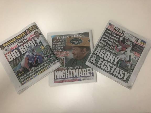 How the city’s two major tabloids covered the locals disastrous week one exploits.