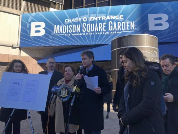 <b>Sen. Brad Hoylman-Sigal (with mic) and Liz Krueger (to his left) at a press conference outside Madison Square Garden in January in which they both condemned James Dolan’s use of facial recognition technology to bar lawyers as well as Assemblyman Tony Simone (far right) from entering MSG-owned venues. They called for ending the Garden’s $42 million property tax exemption.</b> Photo: Keith J. Kelly