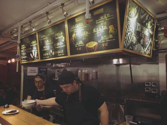 Eric Sze (left), started The Tang, an East Village noodle bar. A generation of Chinese-American cooks are expanding Chinese cuisine's parameters, he said. Photo: Claire Wang