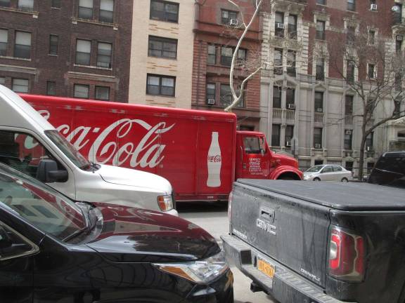 This red-and-white Coca-Cola truck, captured by a West End Avenue resident as it cruised northbound up the avenue at 83rd Street on Sunday, March 25, is not supposed to be driving there. Commercial trucks are prohibited along the entire length of the avenue. Photo: Courtesy of West End Preservation Society