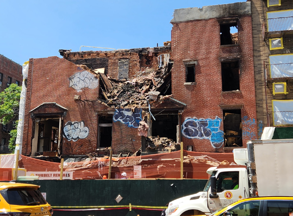 The Department of Buildings ordered this Chelsea building to be demolished and then issued two fines to the contractor assigned to the job on May 20 after a partial collapse of one of the floors.