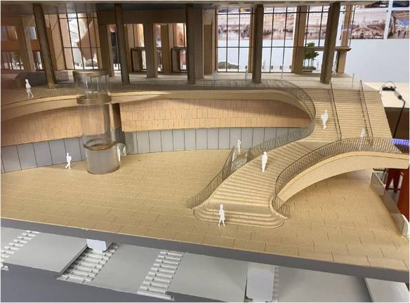 An artist rendition of what developers Halmar, the American subsidiary of the Italian company, ASTM, and Swedish firm Skanska say will be a brighter interior with high ceilings. It will involve buying the Madison Square Garden Theater on Eighth Ave. and building a new entrance.