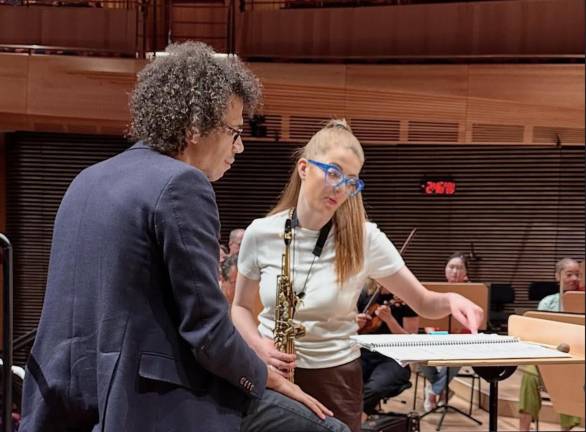 FOLC conductor Jonathan Heyward and saxophonist Jess Gillam.