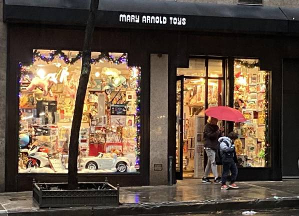 Even on a dark, rainy day, the windows of Mary Arnold Toys are a beacon for families on the UES. Photo: Alexis Gelber