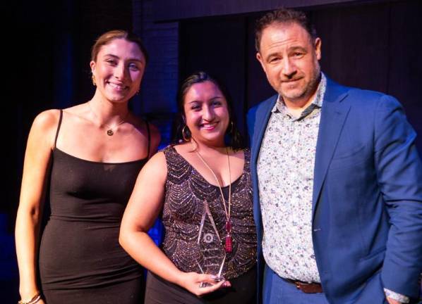 Hannah Ciesil (center), director of <i>Breezy Point, </i>shared the Best Director award with Nicola Murphy Dubey, director of <i>Irishtown. </i>Ciesil is flanked by Ella Barton (left) and the Origin 1st’s Michael “Mick” Mellamphy.