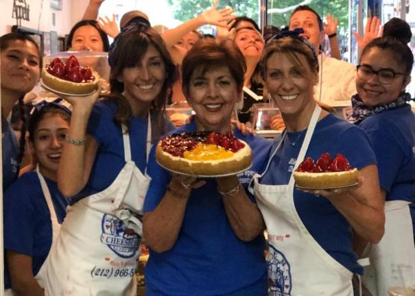 Founder Eileen Avezzano (center) with her daughters Bonnie Ponte (to her left) and Holly Maloney (right). Photo courtesy of Eileen’s Special Cheesecake