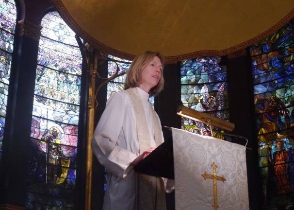 Rev. Katharine Flexer delivering a sermon at St. Michael's Church. Photo by William Mathis.