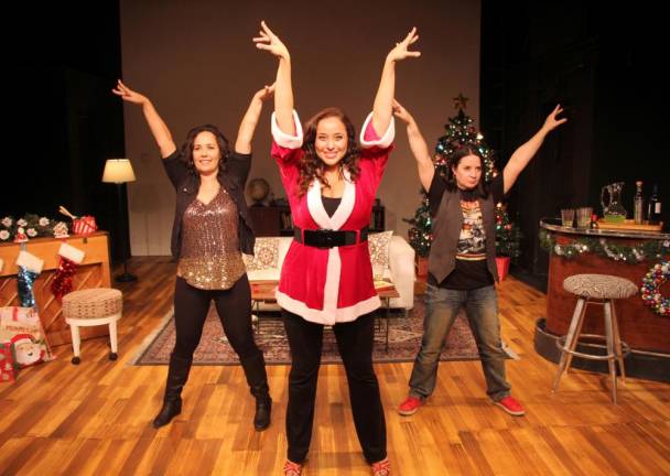 From left to right: Diana Yanez, Maria Russell and Sandra Valls posing on the set of the Latina Christmas Special. Photo courtesy of Latina Christmas Special