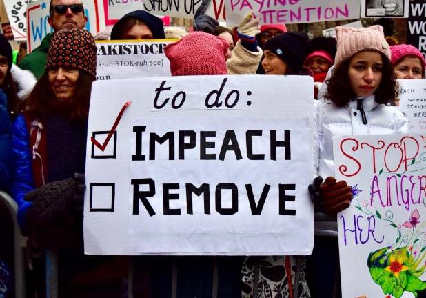 Signs at the rally.