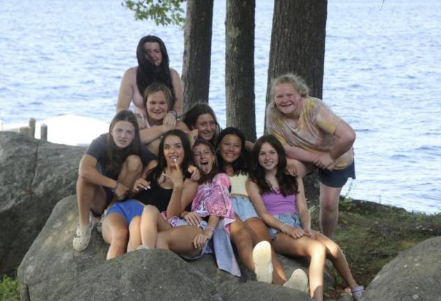 Kids at Camp Bernadette with counselors on the shores of Lake Wentworth in Wolfeboro, NH. Camp Fatima for boy is about a half hour away, both administered by the Diocese of Springfield, Mass. Photo: Camp Bernadette