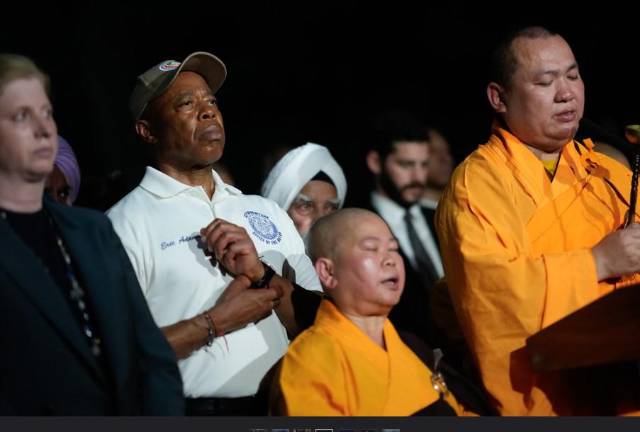 Mayor Eric Adams, center, and NYPD Commissioner Jessica Tisch at a multi-faith prayer service in Bryant Park on July 29, the day after the massacre in a midtown office building at 345 Park Ave.