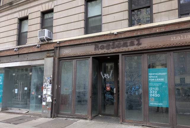 Once home to Italian restaurant Regional, 2607 Broadway is now graffiti covered.