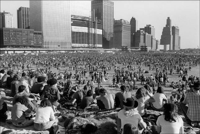 Musicians United for Safe Energy (MUSE) rally and concert on the Battery Park City landfill opposite the World Trade Center twin towers, September 1979. The Vista Hotel was still under construction.
