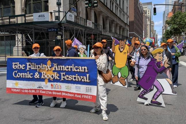 Filipinx American Comic &amp; Book Festival banner (and assorted life-size cutouts).