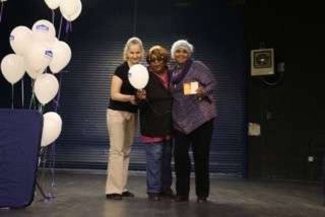 Kathleen Matos, the vice president of the Amsterdam Addition Tenant Association; Patricia Ryan, the association's president; and Janice Sweeting, of the Lincoln Square Board of Directors, on the restored stage at the Lincoln Square Neighborhood Center on West 65th Street. Photo: Melody Chan