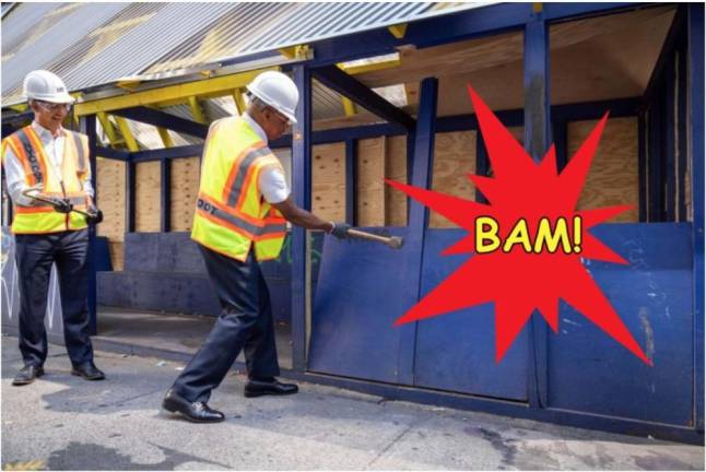 <b>Mayor Eric Adams takes a sledgehammer to an abandoned dining shed. He is promoting legislation that will make the sheds widely available on a seasonal basis for people who like outdoor dining–while still trying to placate other community members who find them to be a source of blight.</b> Photo: Mayor’s Office.