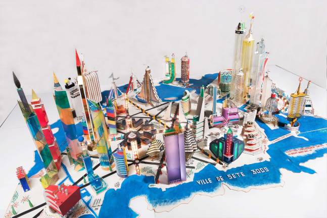 Bodys Isek Kingelez (Congolese, 1948-2015). "Ville de Sète 3009." 2000. Paper, paperboard, plastic, and other various materials, 31 1/2 × 9' 10 1/8? × 6' 10 11/16?. Collection Musée International des Arts Modestes (MIAM), Sète, France. © Pierre Schwartz ADAGP; courtesy Musée International des Arts Modestes (MIAM), Sète, France