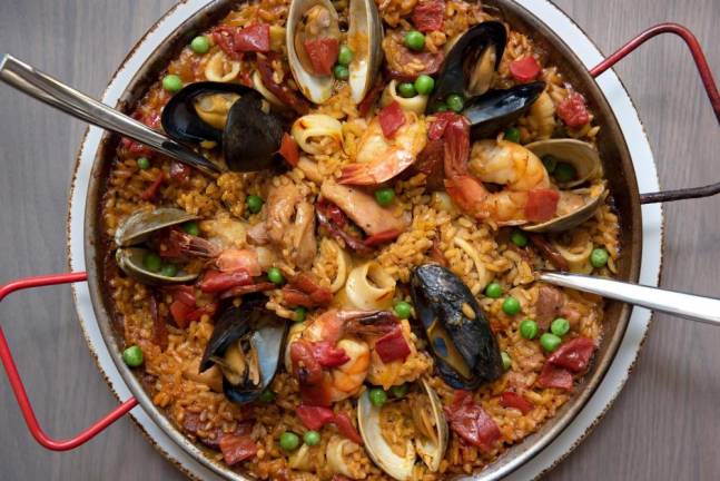 The menu features multiple paellas, a traditional Spanish dish that typically serves two. Photo: Liz Clayman