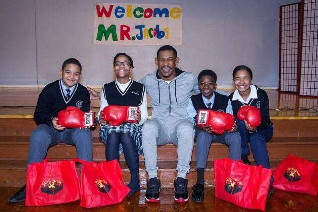 A visit from a boxer at a west side school Scrapbook